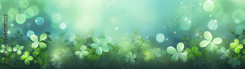 happy new year banner with four-leaf clover as a lucky charm on blurred background photo