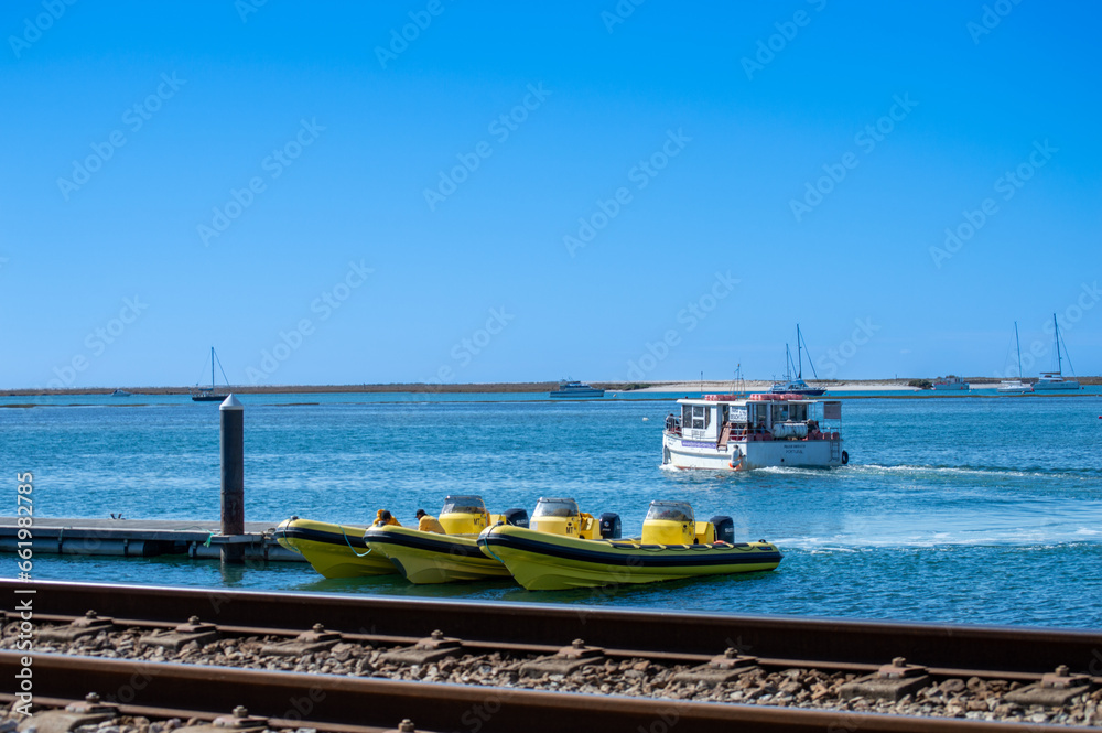 Fototapeta premium Boats in lagoons in Faro, Portugal