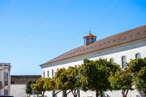 Walking in the historical city center in Faro, Portugal