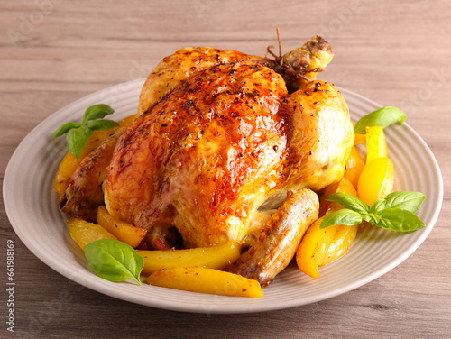 Roast whole chicken with potatoes