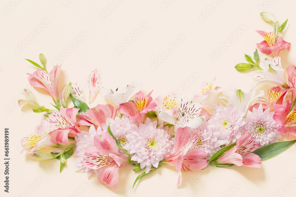 Fototapeta premium alstroemeria and chrysanthemums flowers on yellow background
