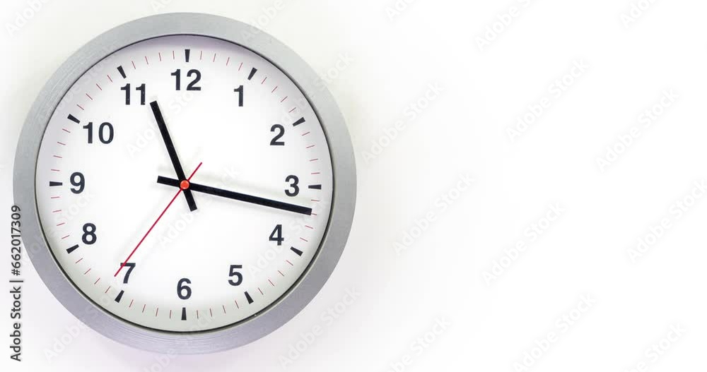Clock face time lapse on white background with copy space for your own text. Clock time ticking on a classic Wall Clock. Shadows moving over the Watch. Half of a Clock dial close-up isolated. Concept Clock face time lapse on white background with copy space for your own text. Clock time ticking on a classic Wall Clock. Shadows moving over the Watch. Half of a Clock dial close-up isolated. Concept
