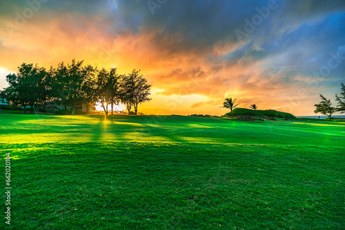 Fototapeta Naklejka Na Ścianę i Meble -  Sunset over the golf field in Maui, Hawaii, USA