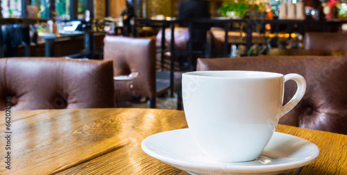 cafe on a wooden table in the background the eiffel tower generative ai 