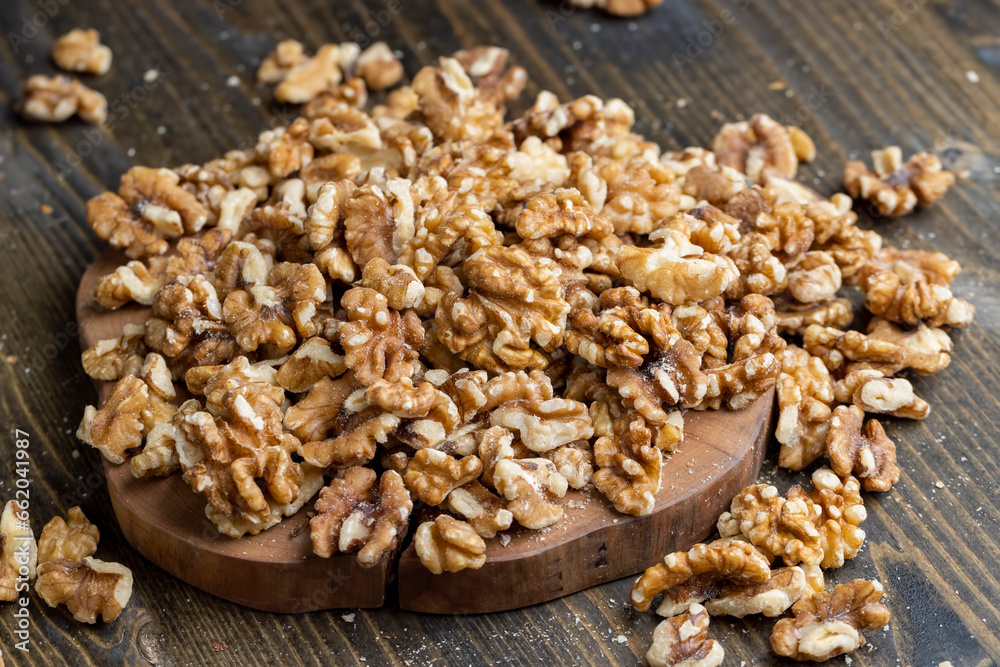 Walnut kernel on the kitchen table during cooking Walnut kernel on the kitchen table during cooking