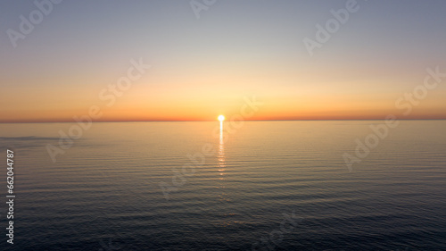 Sunset view over the sea. Seaside sunset view on the beach. golden hour sunset