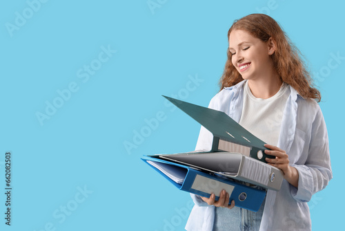 Young woman with document f...