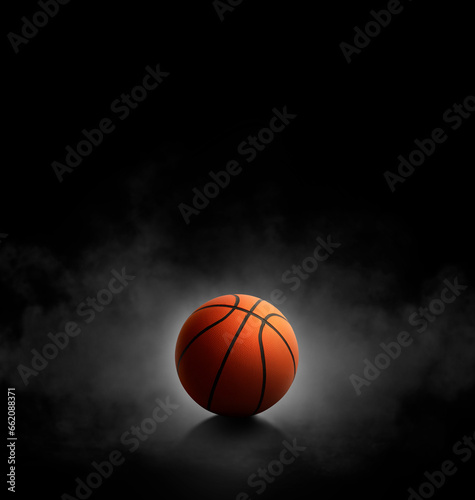 basketball with on black background with smoke © Retouch man