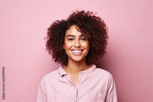 A joyful woman with beautiful curly hair photo
