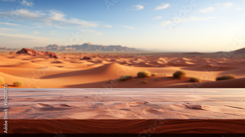 Wooden table top on blur desert background. For montage product display. View of copy space. 