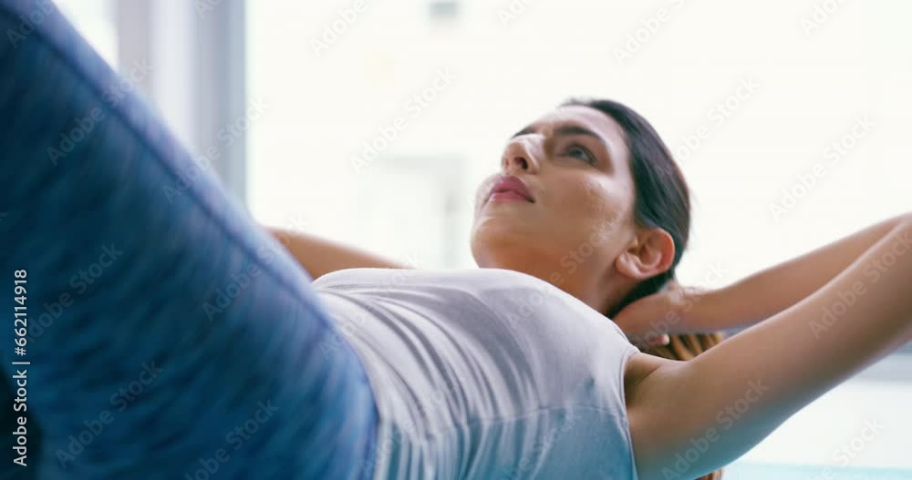 Woman, workout and sit up on floor for health, abdomen muscle and fitness with thinking, goal or wellness. Girl, stomach exercise and strong core with training, home gym or ideas for transformation Woman, workout and sit up on floor for health, abdomen muscle and fitness with thinking, goal or wellness. Girl, stomach exercise and strong core with training, home gym or ideas for transformation