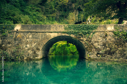 Medieval stone bridge in Orbaneja del Castillo. Burgos, Spain