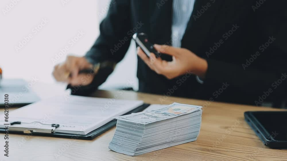 Business car rental company service, Close up hand of agent dealer giving, holding car key to customer renter, new owner after signed rental, purchase contract in document, vehicle sales agreement. Business car rental company service, Close up hand of agent dealer giving, holding car key to customer renter, new owner after signed rental, purchase contract in document, vehicle sales agreement.