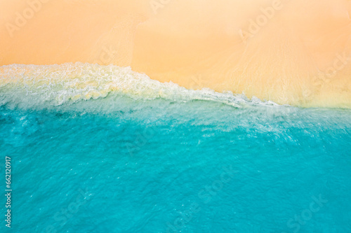 Top drone view fantastic popular travel landscape. Summer seascape blue water yellow sand. Aerial amazing tropical nature background. Beautiful  Mediterranean bright sea waves crash beach sunlight