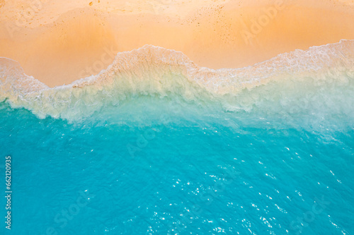 Top drone view fantastic popular travel landscape. Summer seascape blue water yellow sand. Aerial amazing tropical nature background. Beautiful Mediterranean bright sea waves crash beach sunlight
