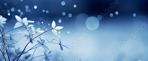 A gentle snowfall, snowflakes appearing as lacy silhouettes, contrasted against a backdrop of inky blue and hazy white bokeh. generative AI