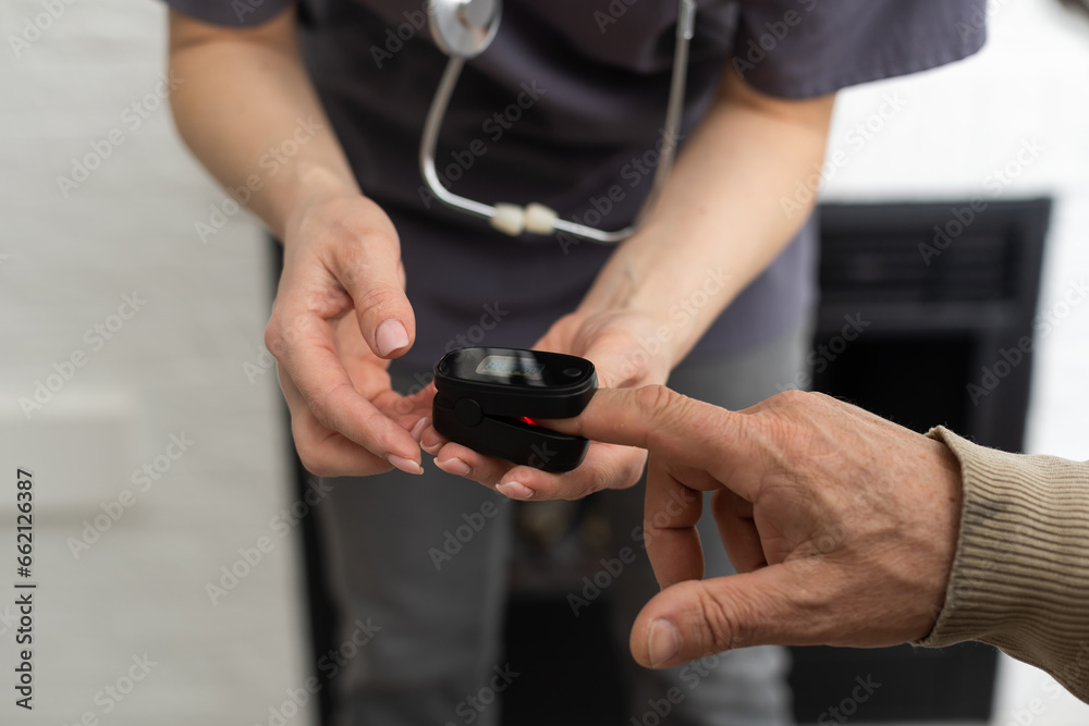 Nurse use pulse oximeter to check patient's oxygen in home , Home healthcare service concept. Nurse use pulse oximeter to check patient's oxygen in home , Home healthcare service concept.