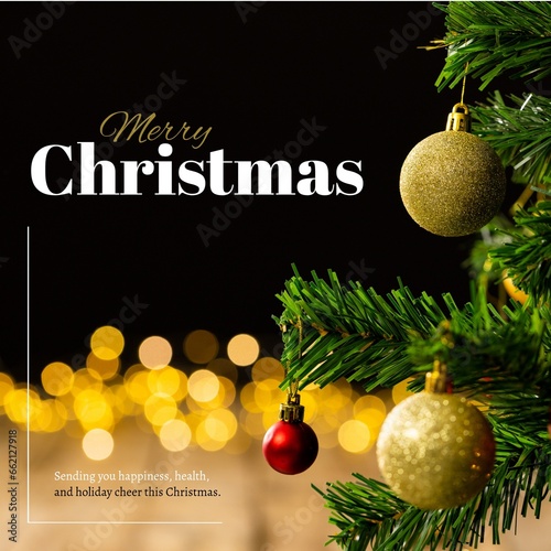 Composite of merry christmas text over chritsmas tree and lens flare, copy space