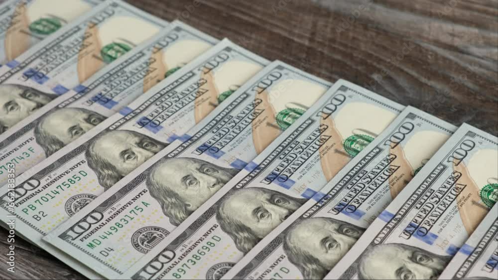 Lots of 100 American dollar bills. Panoramic motion. Lots of 100 American dollar bills. Panoramic motion.