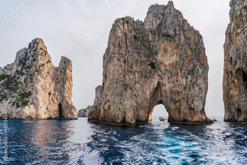 Famous Faraglioni Rocks, Capri island, Italy photo
