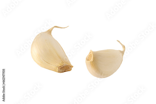 garlic on a light background. garlic cloves. © homeworlds