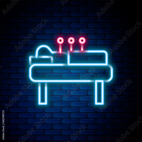 Glowing neon line Acupuncture therapy icon isolated on brick wall background. Chinese medicine. Holistic pain management treatments. Colorful outline concept. Vector