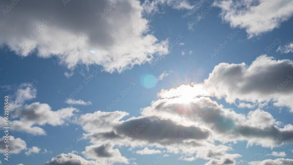 Blue sky white clouds. Puffy fluffy white clouds. Cumulus cloud cloudscape timelapse. Summer blue sky time lapse. Nature weather blue sky. White clouds background. Cloud time lapse