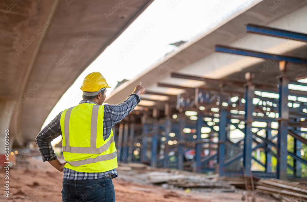 A civil engineer inspected the structure road at expressway under construction. A civil engineer inspected the structure road at expressway under construction.