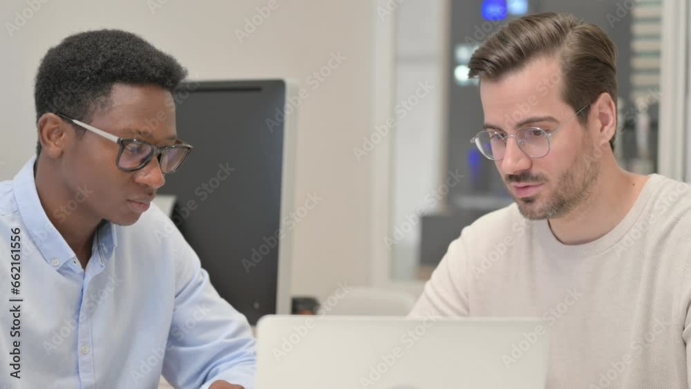 Close up of Business People Working Together in Office Close up of Business People Working Together in Office