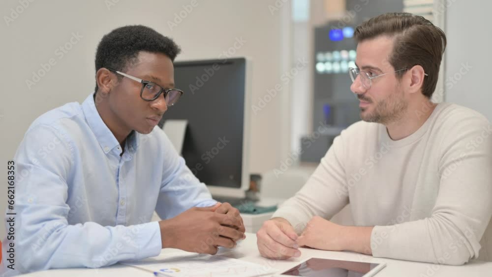 Relax Mixed Race Business People Talking in Office Relax Mixed Race Business People Talking in Office