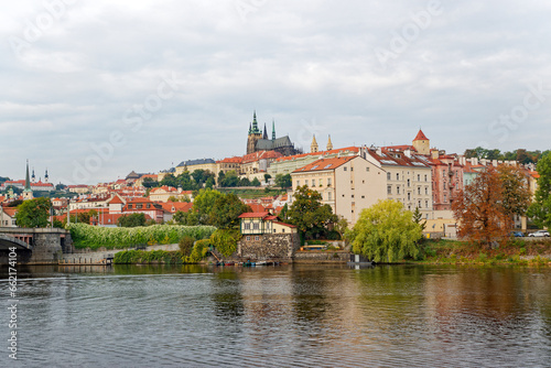 Scenic view of Moldova River with famous old town of Czech City of Prague on a cloudy autumn day. Photo taken October 10th, 2023, Prague, Czech.