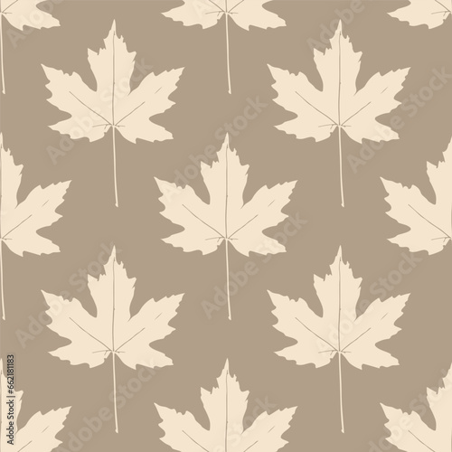 Autumn leaves seamless pattern. Floral wrapping texture. Plant wallpaper design in brown colors.