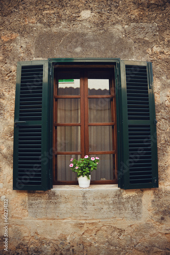 rustic window with Majorcan blinds