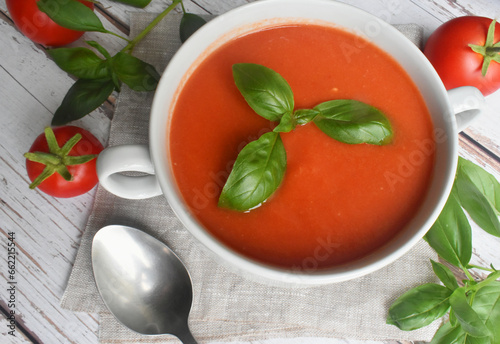 tomato soup with basil leaves