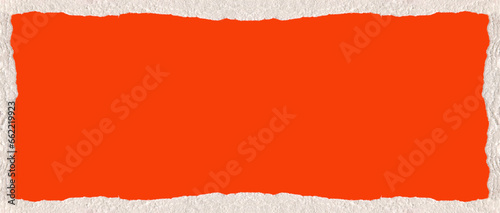 Piece of torn cardboard paper with orange and white edges