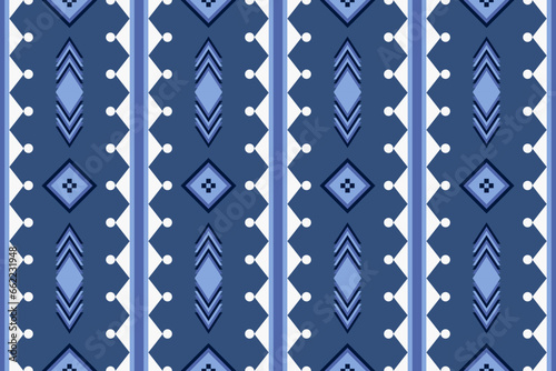 Abstract ethnic aztec geometric pattern design for background.Ethnic ikat geometric pattern for vibrant color.Colorful geometric embroidery for textiles,fabric,clothing,background,batik,knitwear