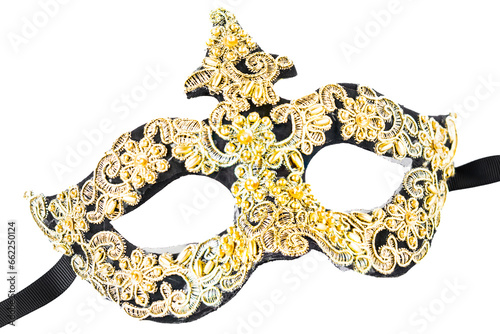 Close up shot of a golden Venetian mask decorated with intricate embossed floral details. Isolated on transparent background, PNG.