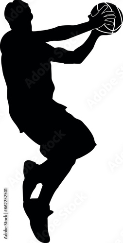 silhouette of a person playing basketball