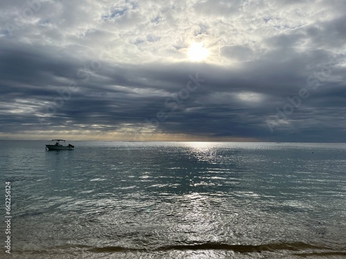 Sun behind clouds over the Indian Ocean