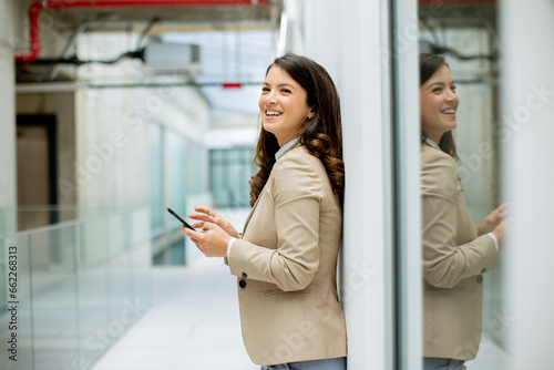 Young business woman using ...