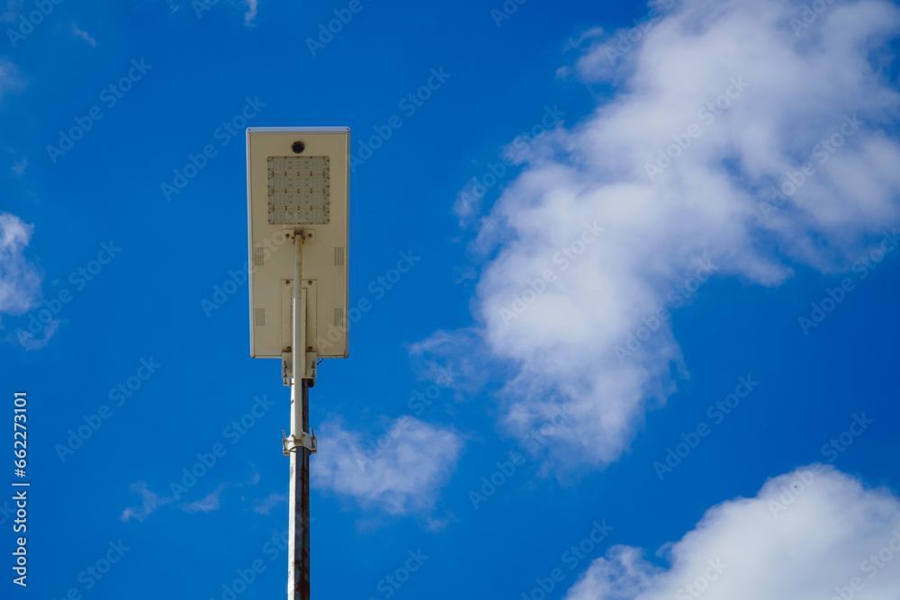 Public street lighting pole with LED lights with cloud and blue sky Public street lighting pole with LED lights with cloud and blue sky