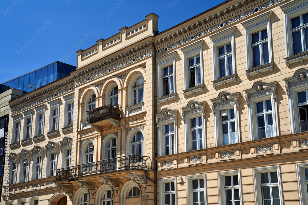 facade of a historic tenement house with balconies in the city of Poznan