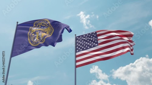 Nebraska and the USA flags on a flagpole realistic wave on strong wind in blue sky. State of Nebraska and The United States of America