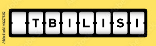 Black color in word tbilisi on slot banner with yellow color background