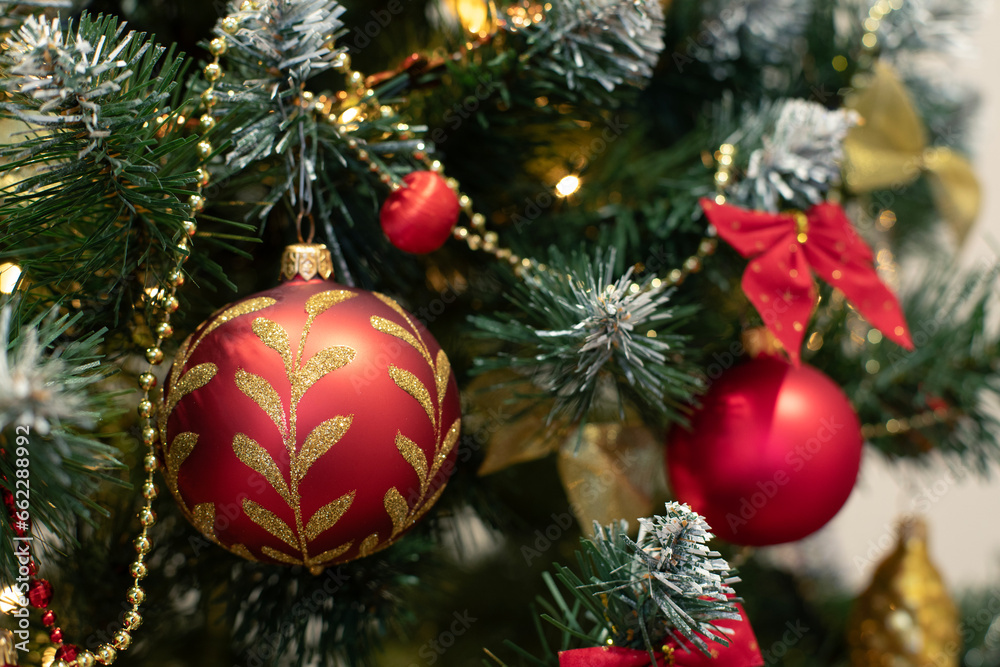 Red baubles and decorations on christmas tree for background. New Year concept. Red baubles and decorations on christmas tree for background. New Year concept.