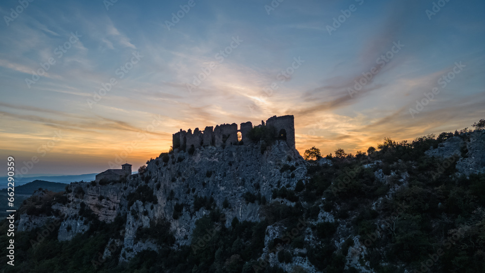 Ruins of the castle of Soyans in Provence in the Drôme during sunset, France