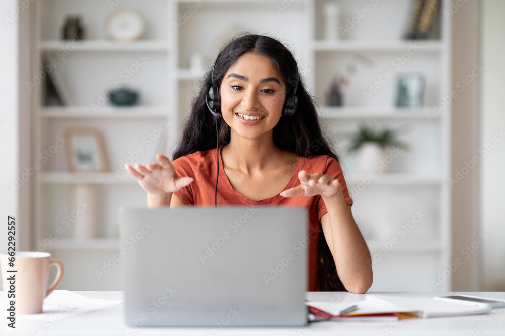 Cheerful Indian Woman Teacher Having Virtual Lesson With Students Cheerful Indian Woman Teacher Having Virtual Lesson With Students