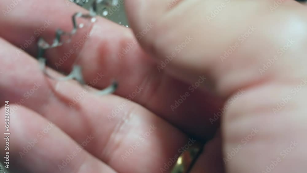 Soft metal shavings. Metal waste. We scrape off the metal shavings with our own hands. High quality 4k footage Soft metal shavings. Metal waste. We scrape off the metal shavings with our own hands. High quality 4k footage