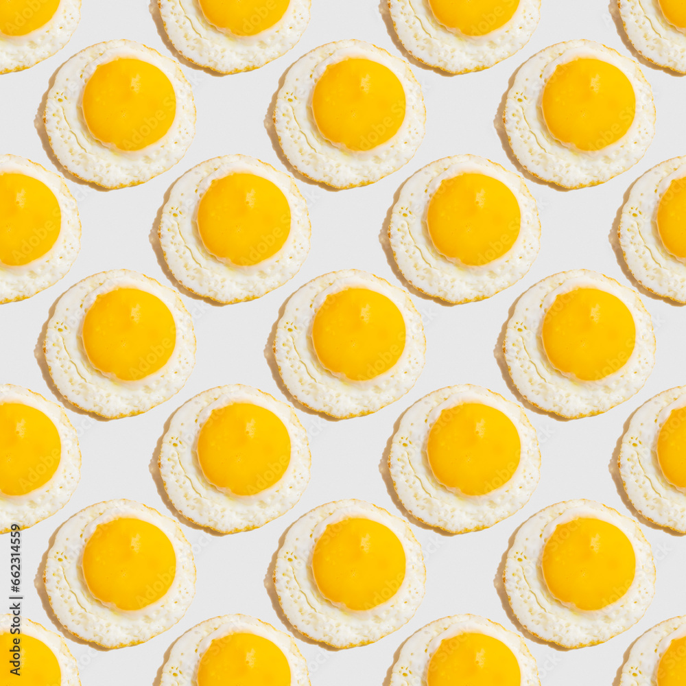Seamless pattern with sunny side up egg on white background. Food board.