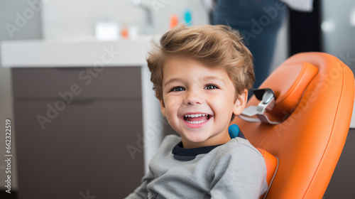 Little boy sits on a chair in a dental clinic